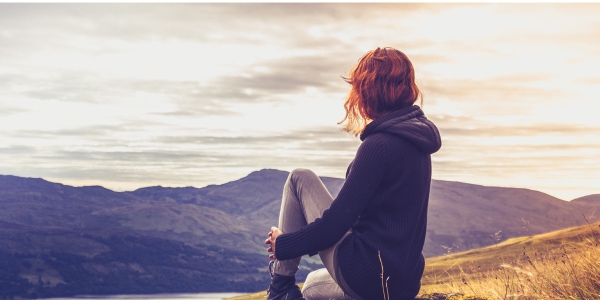 Woman overlooking mountain